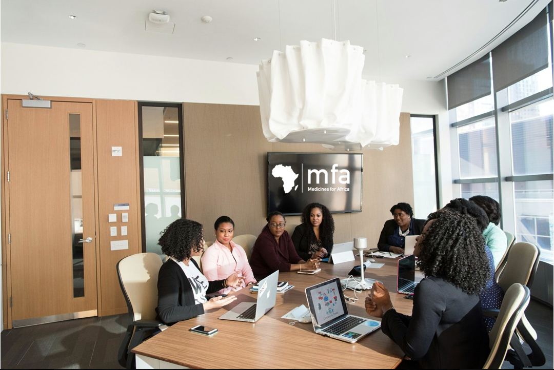 Medicines for Africa team collaborating in a boardroom