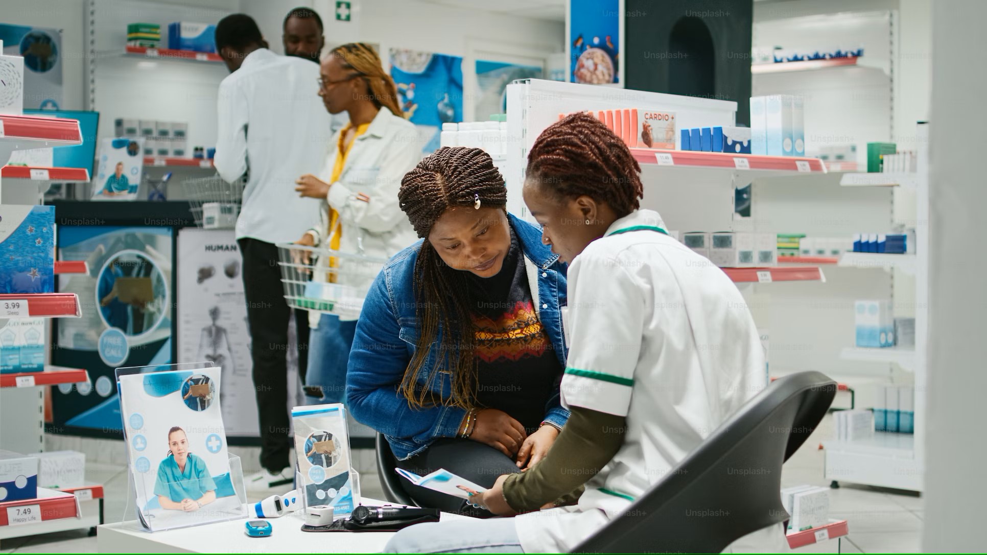 Pharmacist scanning medicine packaging on a pharmacy shelf
